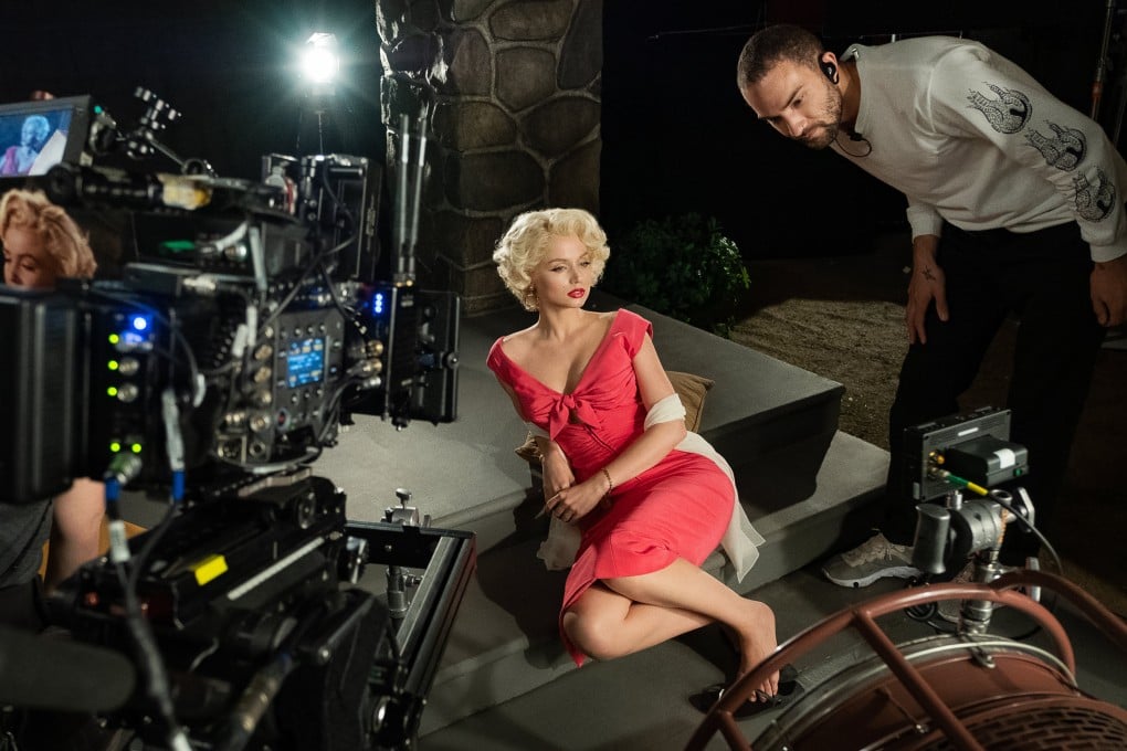 Ana de Armas (centre) as Marilyn Monroe and cinematographer Chayse Irvin on the set of Blonde. Photo: Matt Kennedy/Netflix.