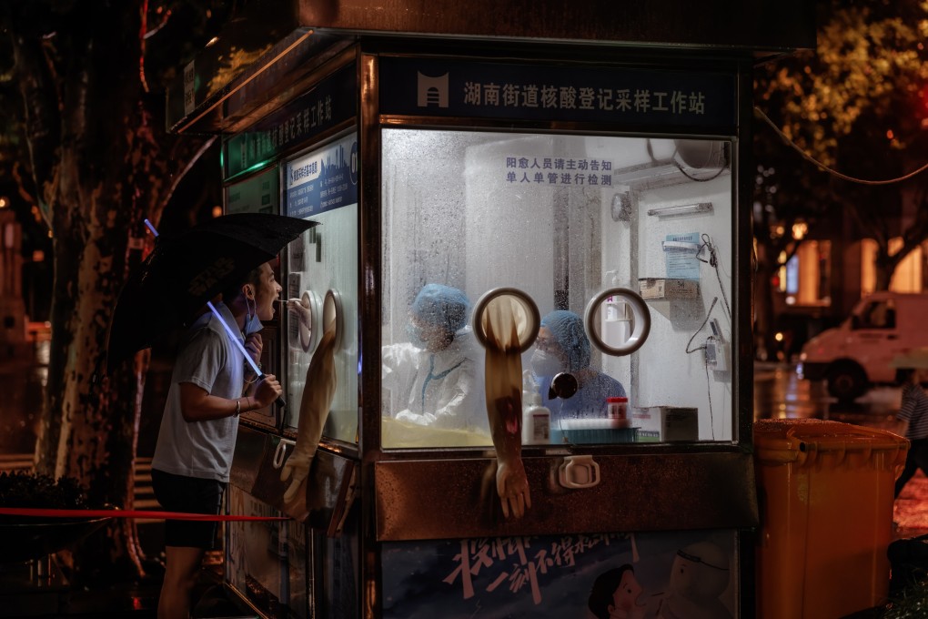 PCR testing booths on city streets have become part of China’s everyday landscape, 1,000 days after the first cases of the new coronavirus were reported to the WHO. Photo: EPA-EFE