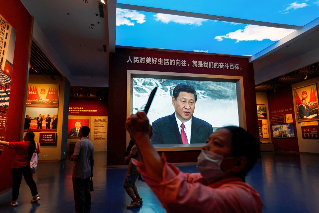 A visitor takes photos at the Museum of the Communist Party of China in Beijing. The party is gearing up for its twice-a-decade national congress. Photo: Reuters