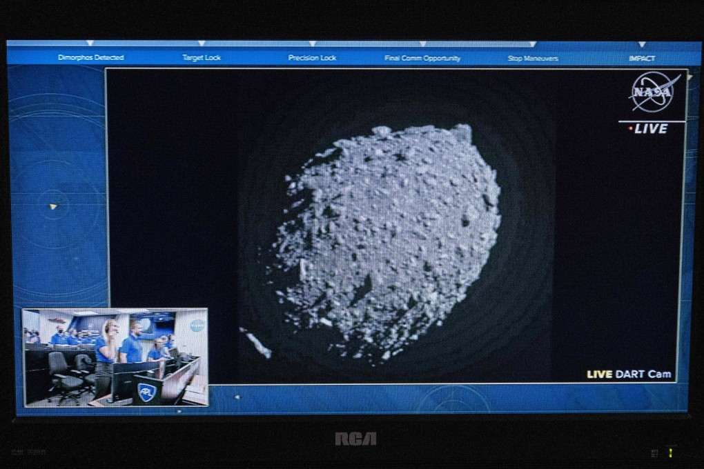A television screen at Nasa’s Kennedy Space Centre in Cape Canaveral, Florida, captures the final images from the Double Asteroid Redirection Test (DART) just before it smashes into the asteroid Dimorphos on Monday. Photo: AFP