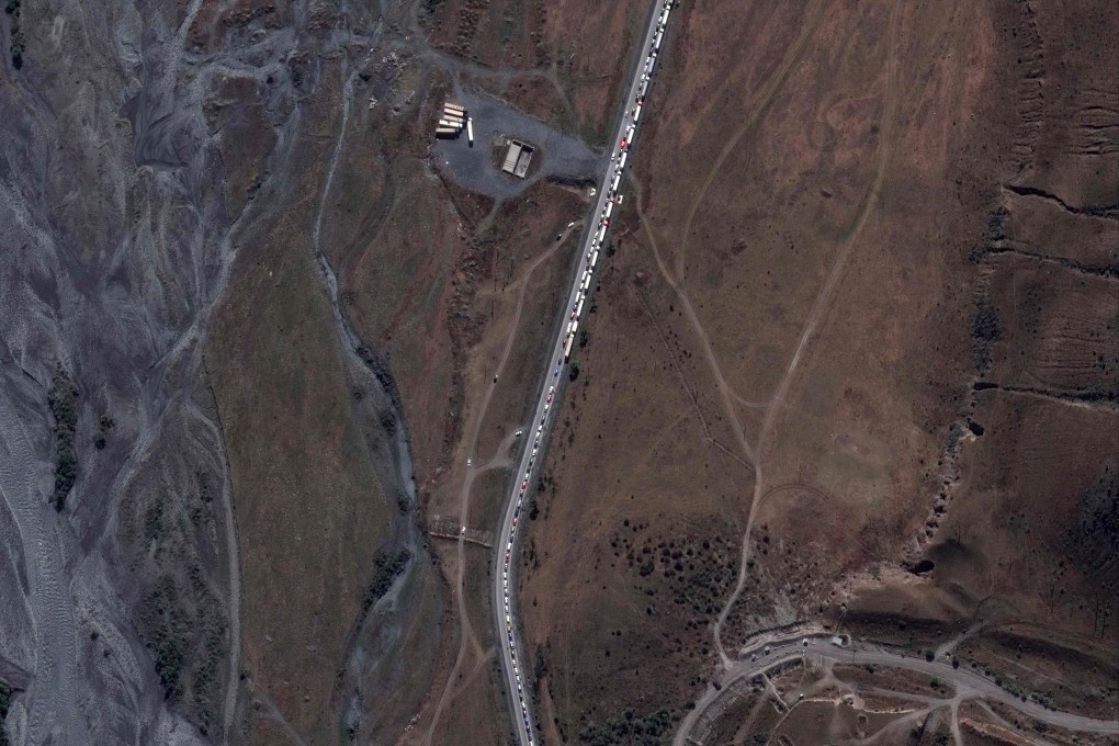 Trucks and cars waiting in a traffic jam near the Russian border with Georgia. Photo: AFP