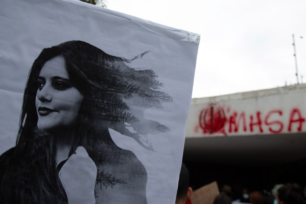 A demonstrator holds a poster during a protest demanding justice for Mahsa Amini, a 22-year-old Iranian woman who died while in the custody of Iran’s Guidance Patrol, in front of the Iranian embassy in Mexico City, Mexico, on September 27.  Photo: EPA-EFE