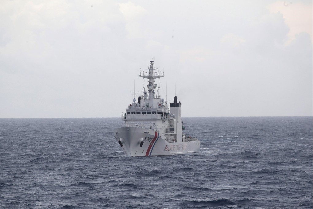 Philippine Coast Guard personnel on the bridge of BRP Gabriela Silang patrol ship sails in the disputed South China Sea. Photo: EPA-EFE