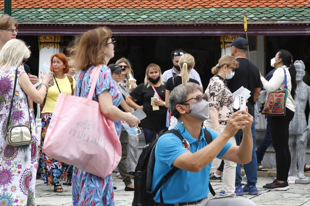 Tourists visit the Emerald Buddha Temple inside the Grand Palace in Bangkok, Thailand. Photo: EPA-EFE