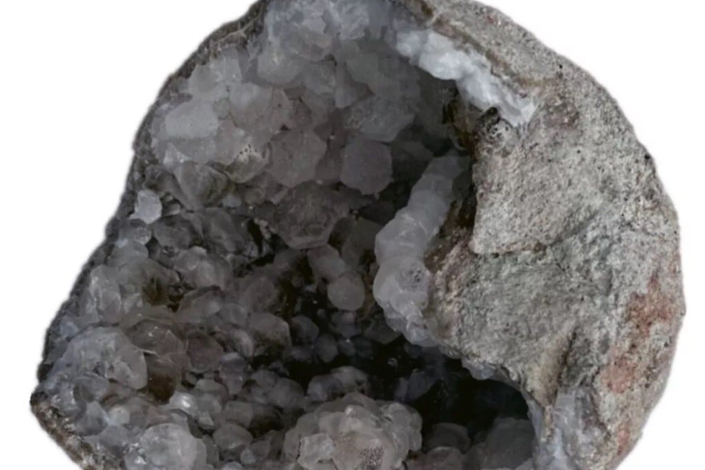 This geode also happens to be a fossilised dinosaur egg. Photo: Journal of Palaeontology