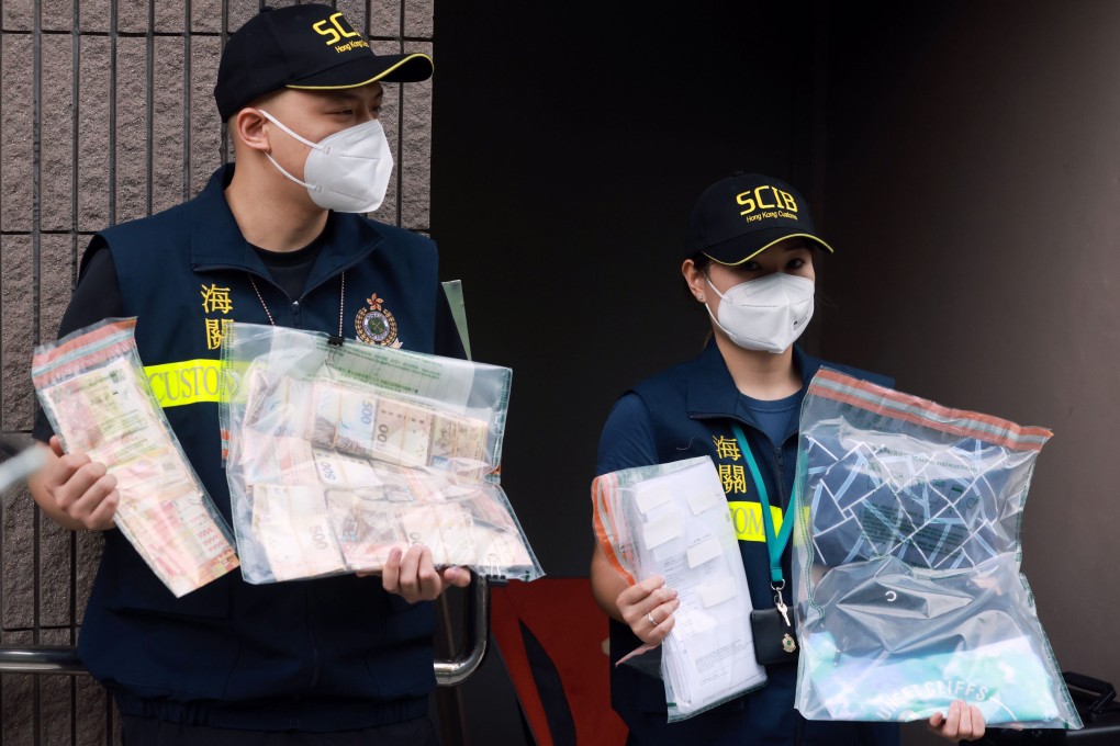 Evidence seized by customs officers as part of an investigation launched after thousands of Mark Six lottery tickets were impounded from a cargo ship in Hong Kong waters. Photo: May Tse.