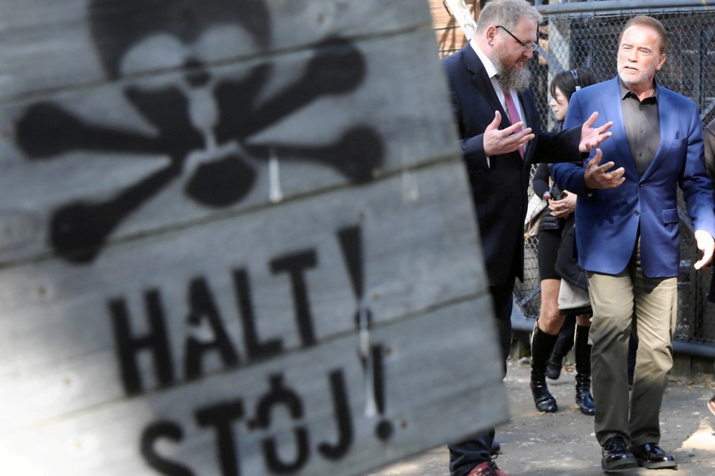 Actor and former California Governor Arnold Schwarzenegger visits former Nazi German concentration camp Auschwitz-Birkenau, near Oswiecim, Poland. Photo: Reuters