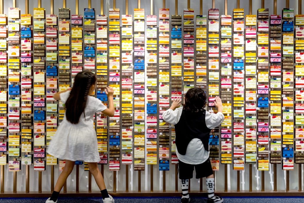 A Lifetastic pop-up shop in Festival Walk, designed by Max Lam Designs, has won an award for its design, which features life-size oil paintings of the cakes it sells.