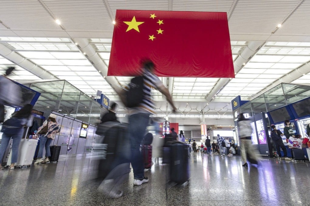Travellers at Shanghai Hongqiao Railway Station on Friday, ahead of the National Day “golden week” holiday. Photo: Bloomberg