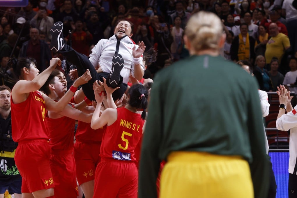China coach Wei Zheng is raised aloft by her team after their World Cup semi-final win over Australia. Photo: EPA-EFE