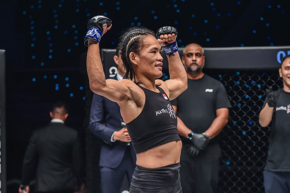 Tiffany Teo of Singapore celebrates a submission victory over Ritu Phogat at ONE 161.