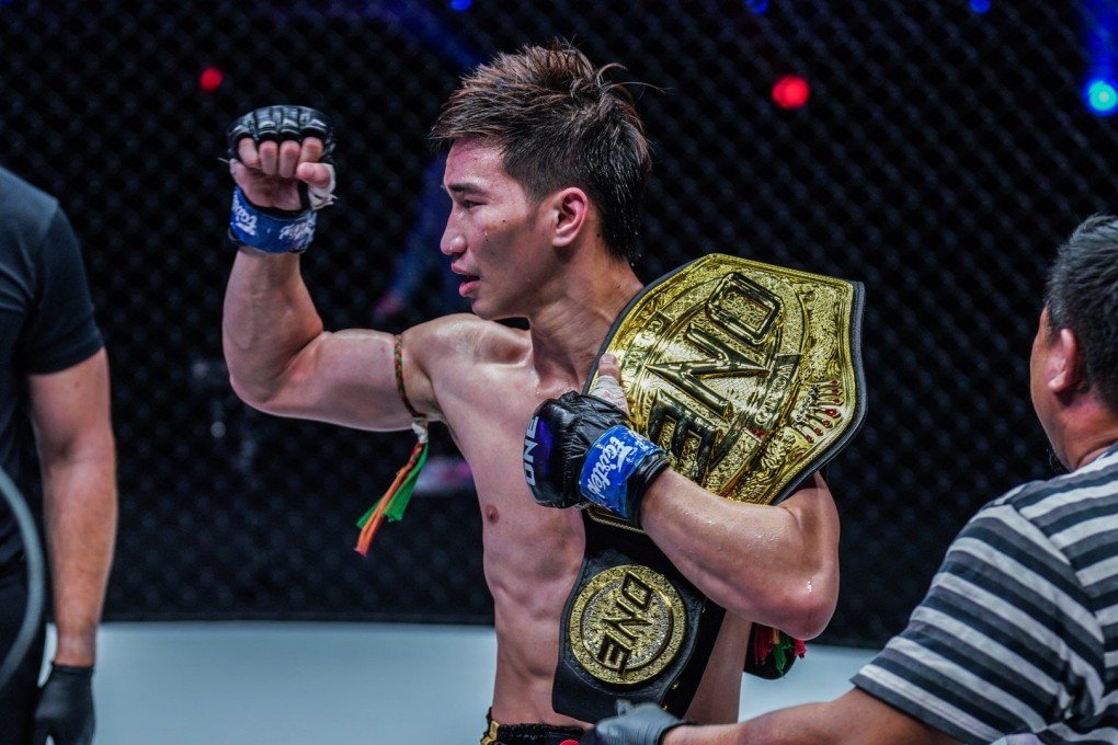 Tawanchai celebrates after winning the ONE Championship featherweight Muay Thai title with a decision defeat of Petchmorakot. Photos: ONE Championship