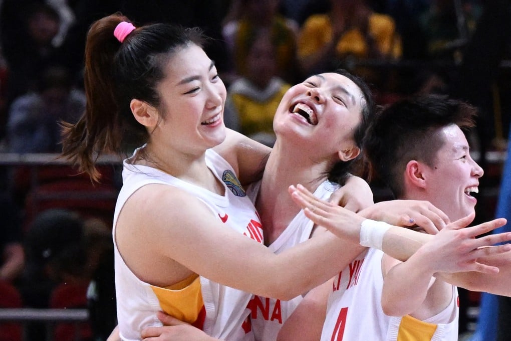 China’s Li Meng (left) and Zhang Ru celebrate after beating France in the quarter-final of the Women’s Basketball World Cup. Photo: AFP