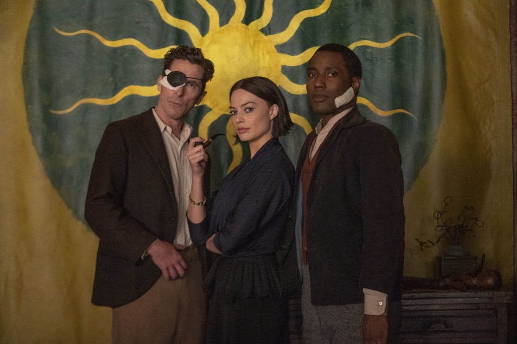 (From left) Christian Bale, Margot Robbie and John David Washington in a still from Amsterdam.