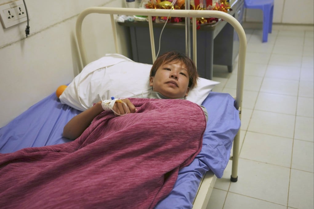 A survivor rescued from a sinking boat recuperates in a hospital in Cambodia’s Preah Sihanouk province on September 24. Photo: AP