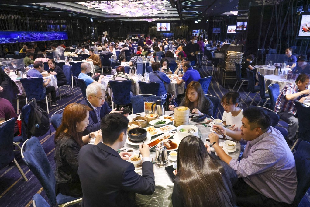 Hong Kong is set to further ease social-distancing measures and allow up to 12 people per table at restaurants. Photo: Dickson Lee