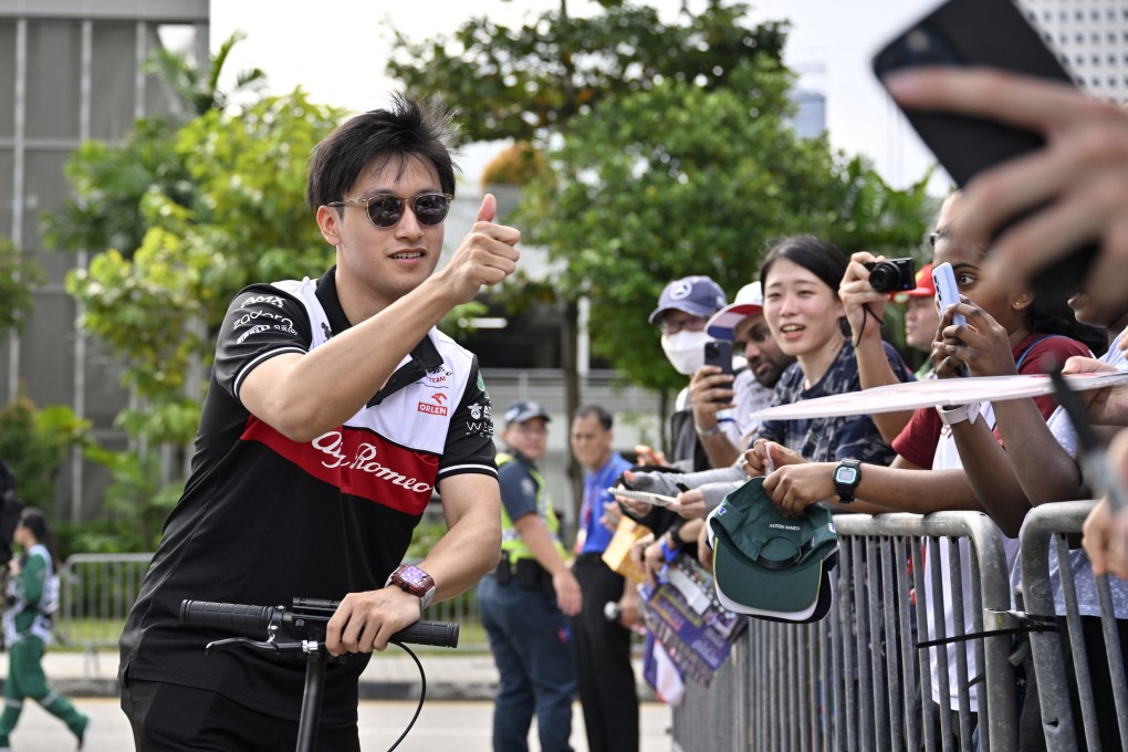 Alfa Romeo’s Zhou Guanyu arrives at Marina Bay Street Circuit in Singapore before practice. Photo: Reuters