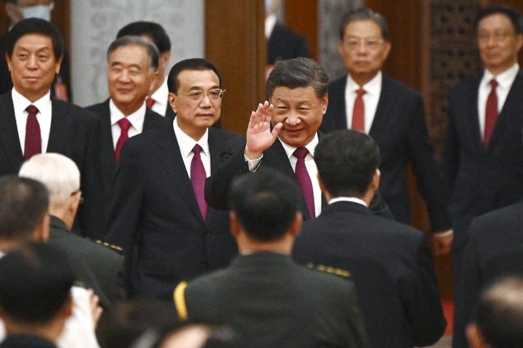 President Xi Jinping (centre) and Premier Li Keqiang (on Xi’s left) arrive for a reception at the Great Hall of the People on the eve of China’s National Day in Beijing. Photo: AFP