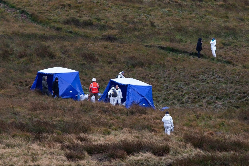 Police specialists and firefighters continue the search for Moors murder victim Keith Bennett following the discovery of a child’s skull in Oldham, UK on Saturday. Photo: EPA-EFE