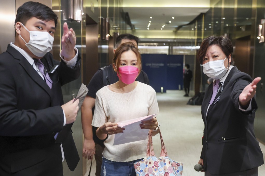Potential buyers line up at the sales office of Henderson Land Development’s One Innovale-Bellevue project at Mira Place in Tsim Sha Tsui on October 2, 2022. Photo: Edmond So