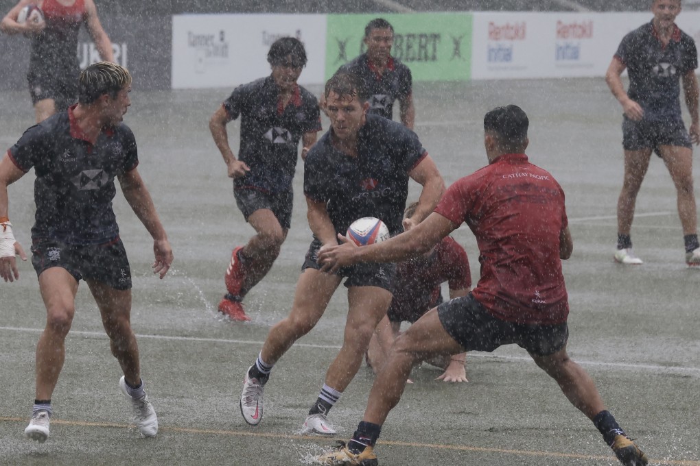 The Hong Kong men’s sevens squad was put through its paces during a soggy training session at King’s Park on Friday. Photo: Jonathan Wong