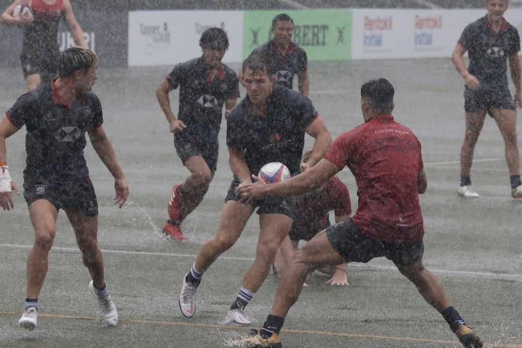 The Hong Kong men’s sevens squad was put through its paces during a soggy training session at King’s Park on Friday. Photo: Jonathan Wong