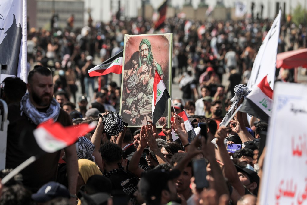 Anti-government protesters gather in Tahrir Square in Baghdad, Iraq on Saturday during a demonstration marking the third anniversary of the 2019 anti-government protests. Photo: dpa