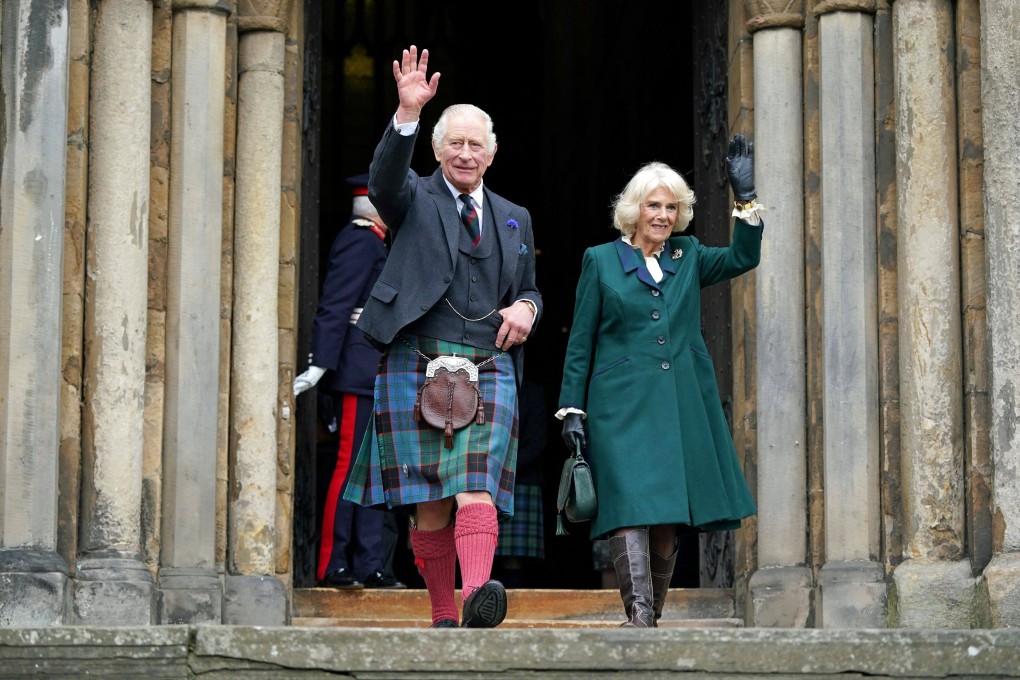 Britain’s King Charles and Camilla, the queen consort, leave Dunfermline Abbey in Scotland. Photo: AFP