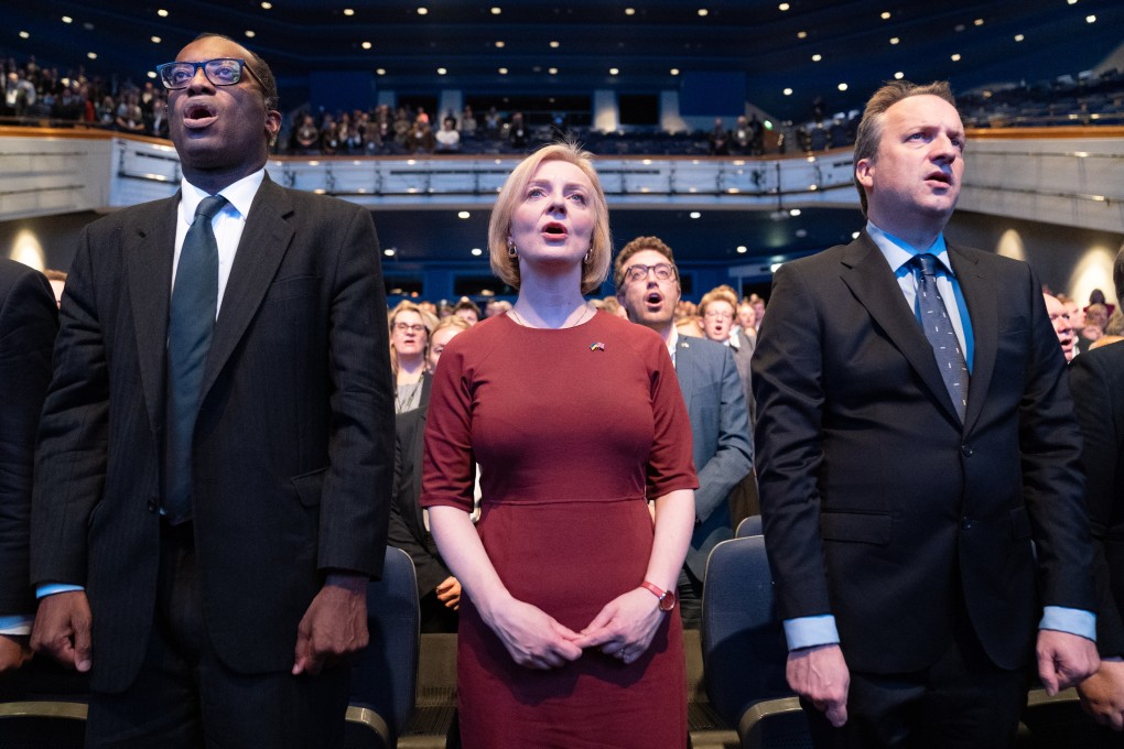 UK Chancellor of the Exchequer Kwasi Kwarteng, Prime Minister Liz Truss and her husband Hugh O’Leary, right, at the start of the Conservative Party annual conference at the International Convention Centre in Birmingham on Sunday. Photo: PA Wire / dpa