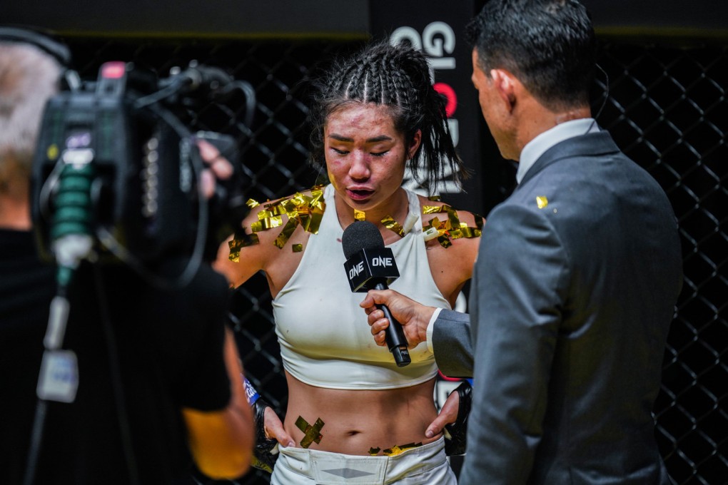 Angela Lee speaks to commentator Mitch Chilson after losing to Xiong Jingnan in Singapore. Photos: ONE Championship