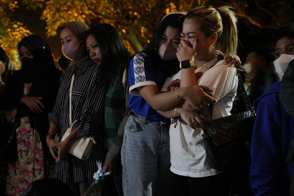 Mourners outside the Kanjuruhan Stadium in Malang, Indonesia on Tuesday. Photo: AP