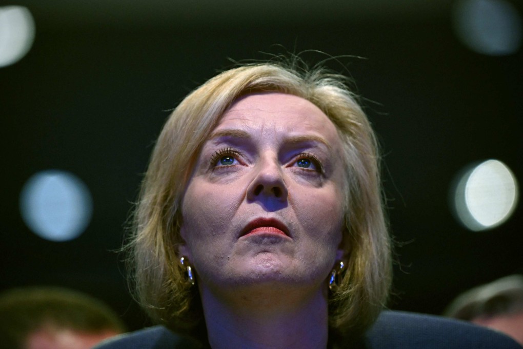 Britain’s Prime Minister Liz Truss listens as Britain’s Chancellor of the Exchequer Kwasi Kwarteng delivers his keynote address on the second day of the annual Conservative Party Conference in Birmingham. Photo: AFP