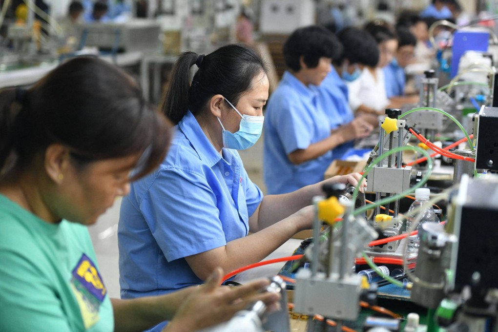More than half of Taiwanese companies with mainland China operations have already relocated, or plan to relocate, some operations away from the mainland, according to newly released survey results. Photo: AFP