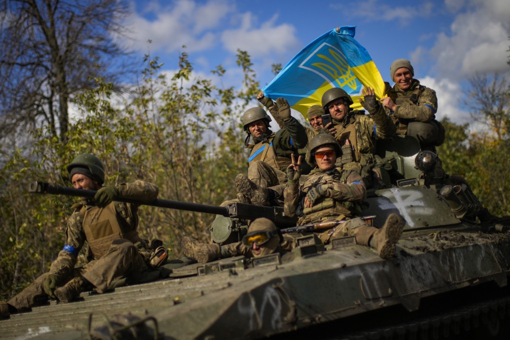 Ukrainian troops on a road between Izium and Lyman. Kyiv’s forces have taken back dozens of towns in regions in the south and east. Photo: AP