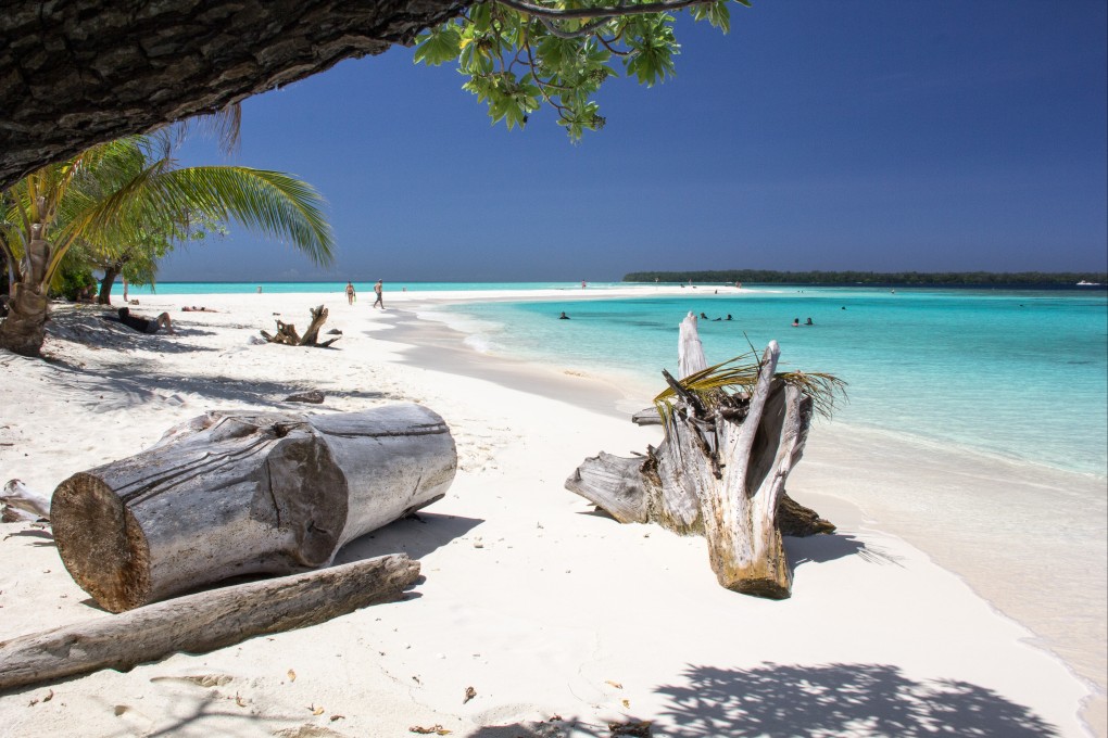 Pristine waters and white sandy beaches are common features of the 21 uninhabited islands in Papua New Guinea’s Conflict Group island atoll. Photo: Shutterstock