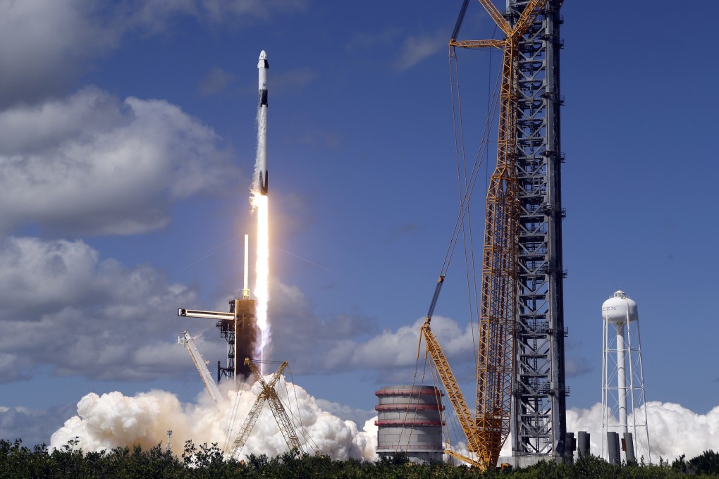 A SpaceX Falcon 9 rocket carrying a Crew Dragon capsule lifts off from the Kennedy Space Centre on Wednesday. Photo: AP