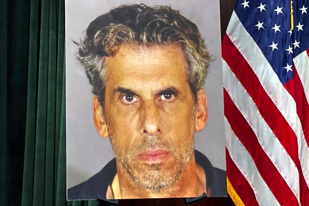 A photo of TV producer Eric Weinberg is displayed before a news conference to announce sexual assault charges against him in Los Angeles. Photo: AP
