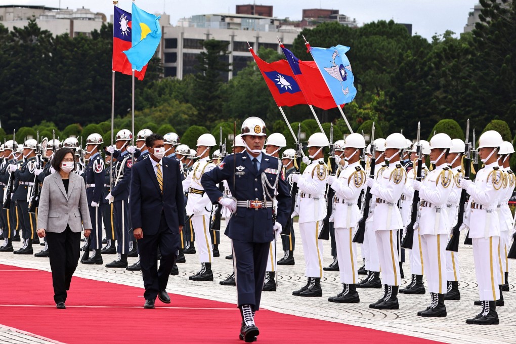 Taiwanese President Tsai Ing-wen welcomes Palau President Surangel Whipps at a ceremony in Taipei on Thursday. Photo: Reuters