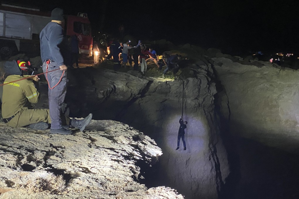 Authorities and local residents save a migrant during a large-scale rescue operation on the island of Kythira. Photo: AP