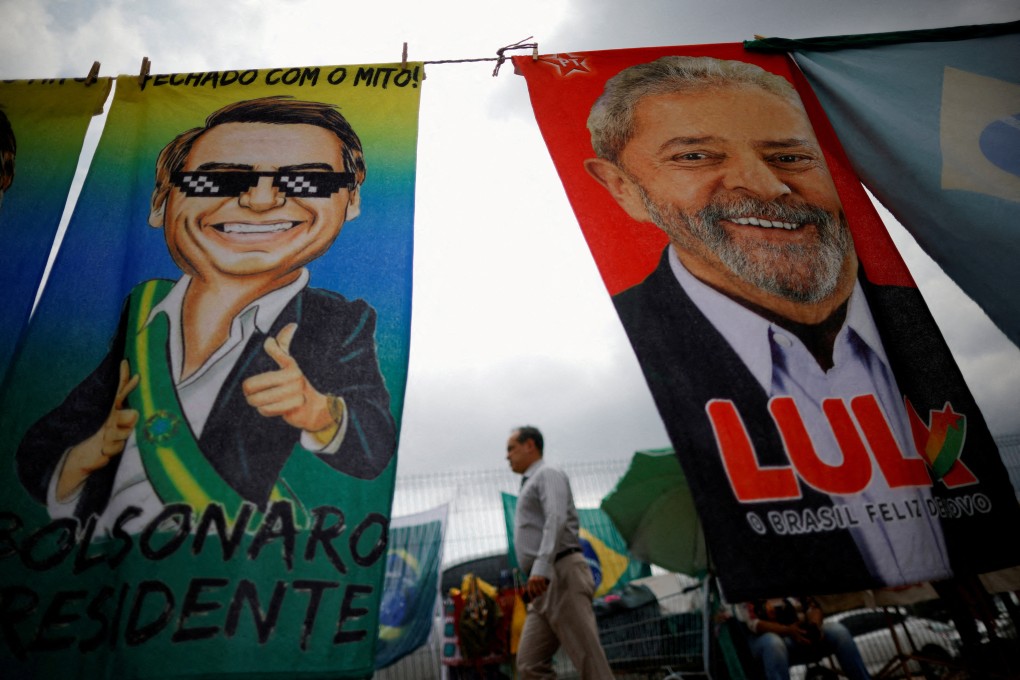 A man walks past presidential campaign posters in Brasilia, Brazil, on September 23. Photo: Reuters