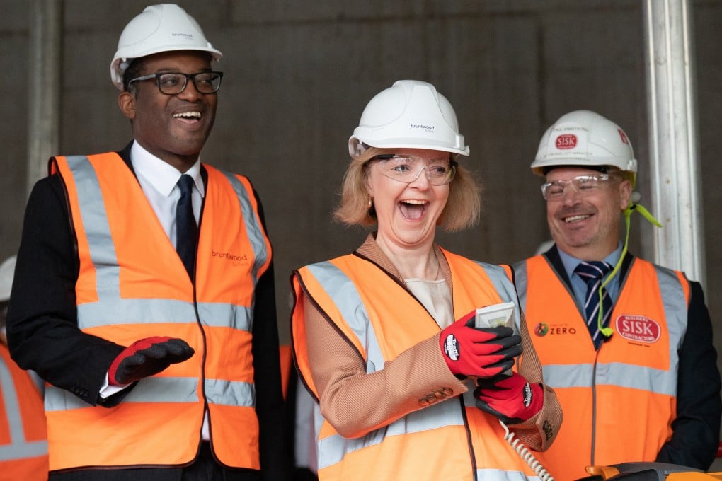 British Prime Minister Liz Truss (centre) and Chancellor of the Exchequer Kwasi Kwarteng visit a construction site for a medical innovation campus in Birmingham, England, on October 4. The wild swings in the pound and the collapse of Britain’s creditworthiness during Truss’s premiership have left the country resembling a risky developing economy. Photo: Reuters
