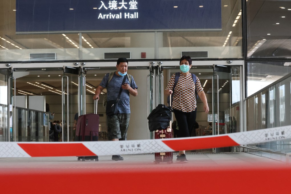 Travellers from the mainland arrive in Hong Kong on September 13. Fully reopening the border between Hong Kong and the mainland remains a sticking point in the process of ending the official insistence on “zero Covid”. Photo: K. Y. Cheng