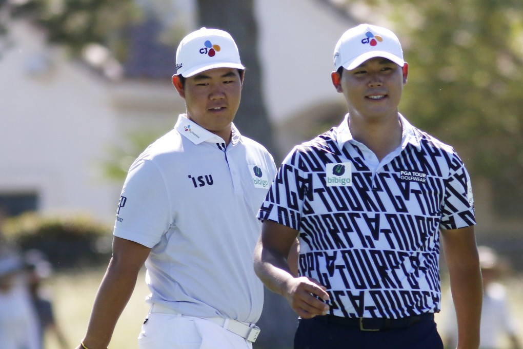 Si Woo Kim (left) and Tom Kim walk along the fairway at the ninth hole during the first round of the Shriners Children’s Open. Photo: AP