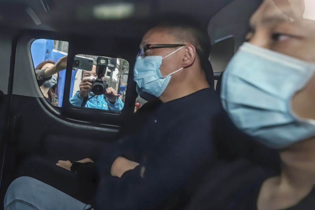 Online radio host ‘Giggs’ being escorted by police for questioning in 2020. Photo: Xiaomei Chen