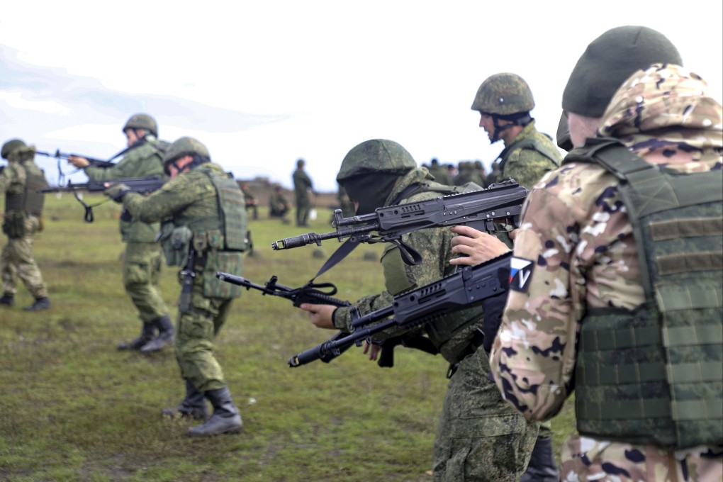 Russian Army recruits hold their weapons during a military training at a firing range in Donetsk People’s Republic controlled by Russia-backed separatists in eastern Ukraine on Tuesday. Photo: AP