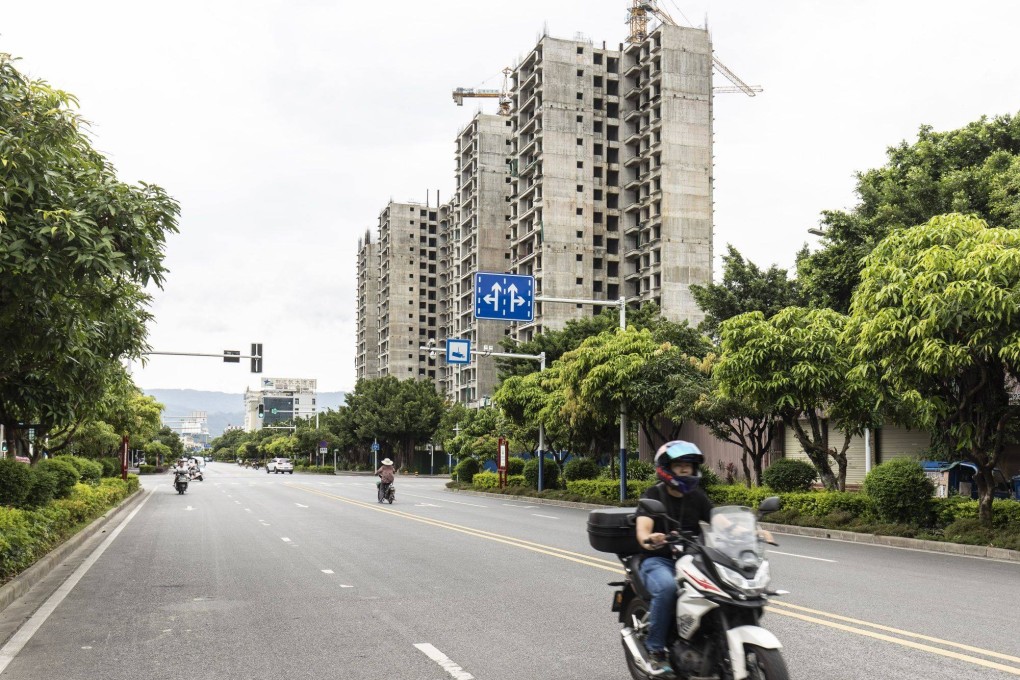 Residential buildings under construction in Ruili, Yunnan province. Home sales in China have slowed considerably this year amid a weakening economy. Photo: Bloomberg