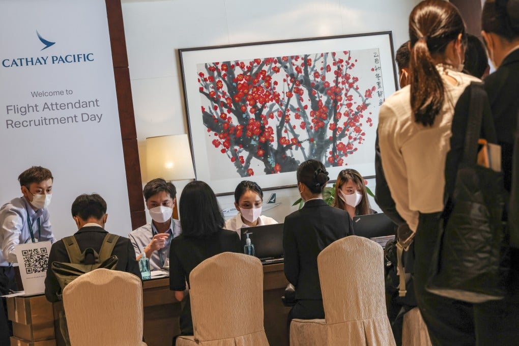 Jobseekers line up at a Cathay Pacific recruitment fair. Photo: Jelly Tse
