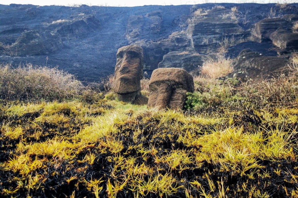 Damaged Moai statues after a fire at a local park in Easter Island, Chile on October 7. Photo: Rapa Nui Municipality / Handout via Reuters