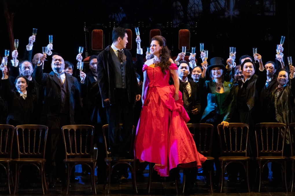 The ballroom scene in Act 1 of Opera Hong Kong’s production of La Traviata with Violetta (Venera Gimadieva) and Alfredo (Kang Wang). Photo: Opera Hong Kong