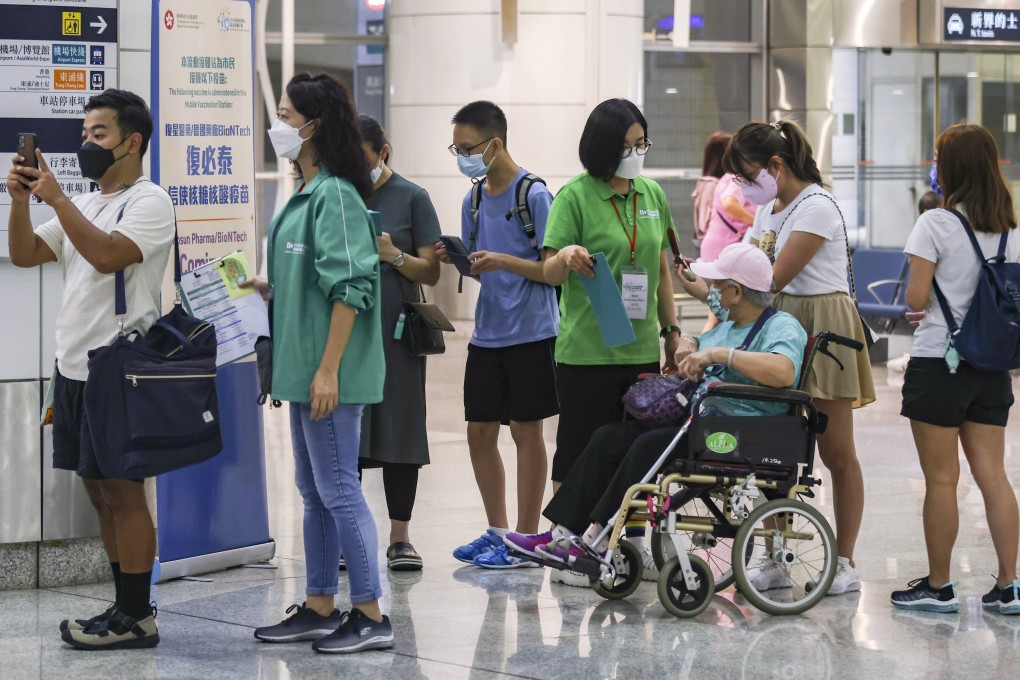 Hongkongers queue to get their BioNTech shots at Tsing Yi. Photo: Jonathan Wong